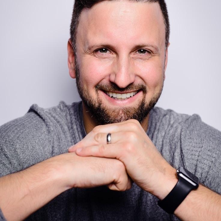 A Client Relations Director discussing corporate gifting strategy with business clients